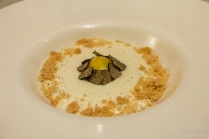 Marinated Egg Yolk over Pecorino Cheese Cream, Parmesan Crumble and Truffle